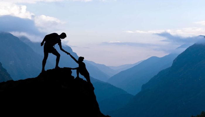 teamwork-couple-climbing-helping-hand-2021-08-26-22-35-18-utc